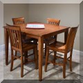 F36. Hightop game table with 4 chairs. 36"h x 42"w x 42"d 